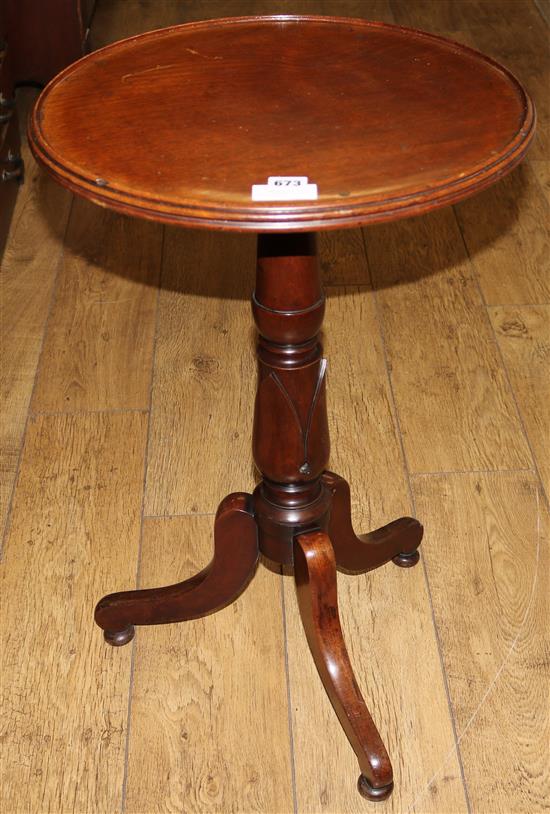A Victorian circular mahogany wine table on tripod 47cm
